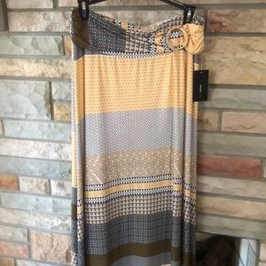 Skirt. Brand new. Black, white, yellow, gold